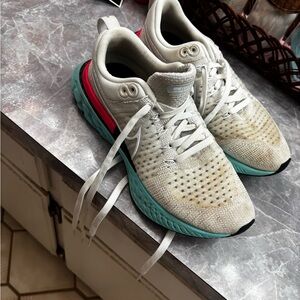 White and Teal Athletic Shoes